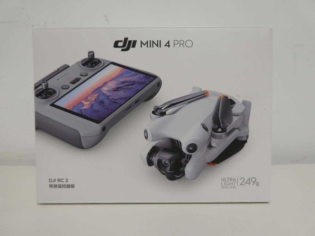 Lot DJI Mini 4 Pro drone, boxed with remote...