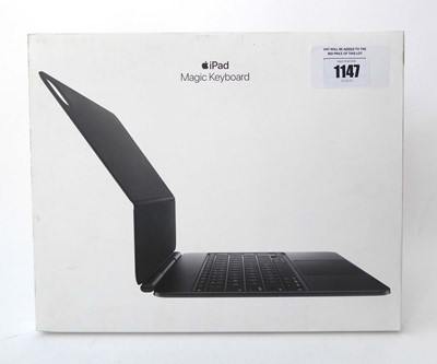 Lot 1147 - Apple iPad Magic Keyboard - Black, British,...