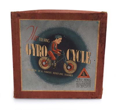 Lot 230 - A Tri-ang tinplate Gyro Cycle, boxed