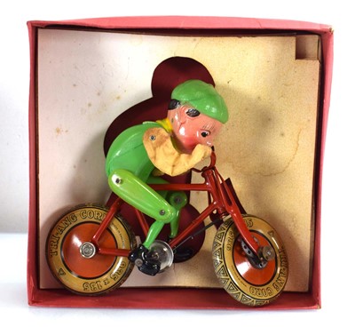 Lot 230 - A Tri-ang tinplate Gyro Cycle, boxed
