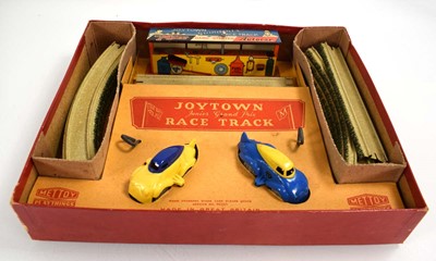 Lot 236 - A Mettoy Joytoy race track set, boxed