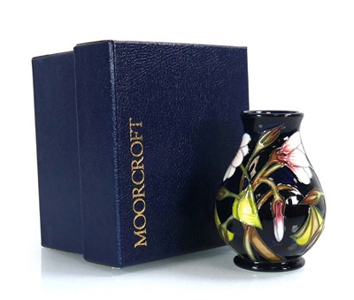 Lot 305 - A small Moorcroft vase of slender ovoid form...