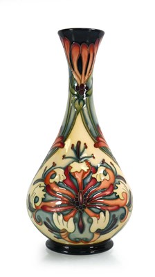 Lot 315 - A Moorcroft bottle vase of slender form...