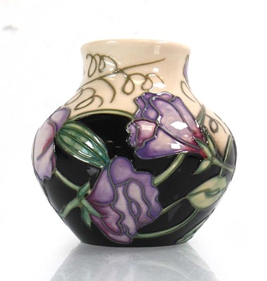 Lot 317 - A small Moorcroft vase of baluster form...