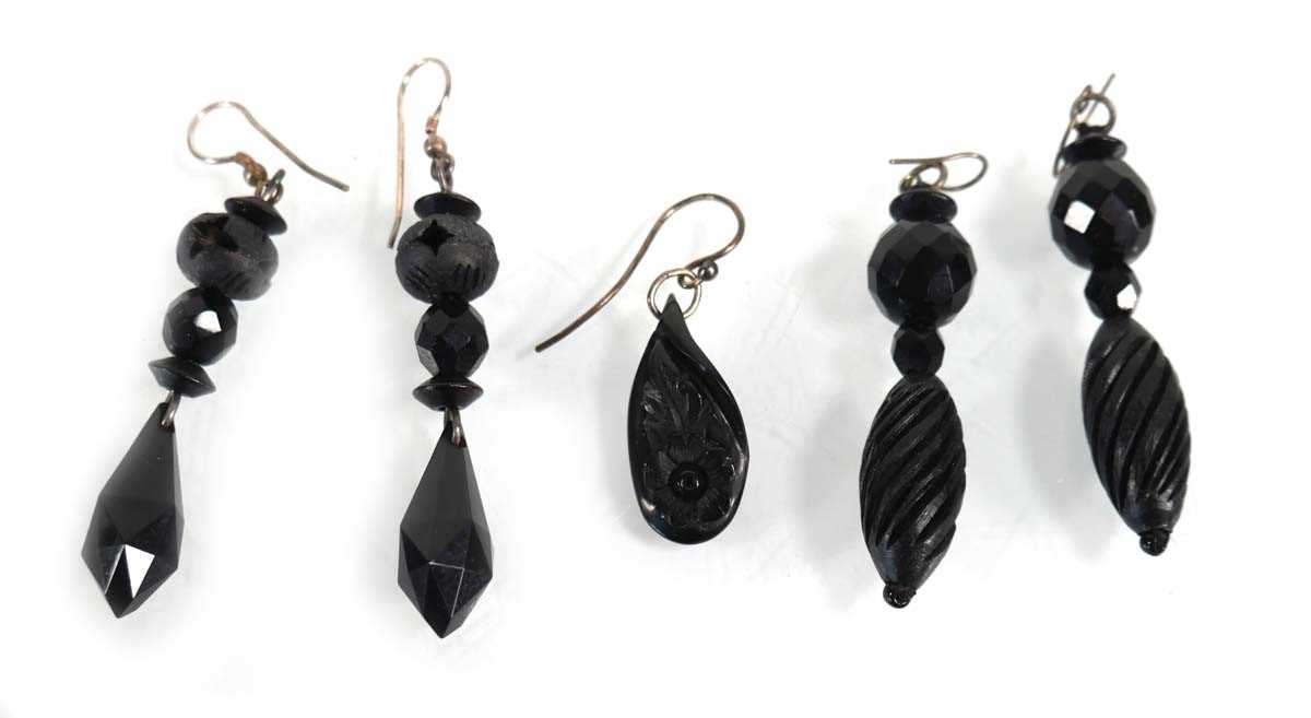 Lot 748 - Two pairs of jet type ear pendants and a...