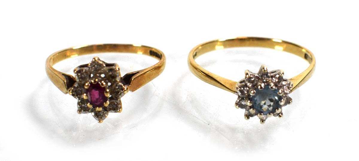 Lot 746 - Two 9ct yellow gold cluster rings set diamonds...