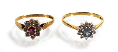 Lot 746 - Two 9ct yellow gold cluster rings set diamonds...