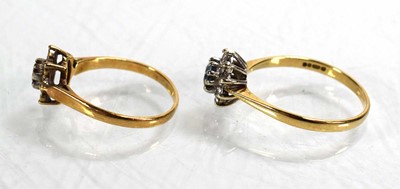 Lot 746 - Two 9ct yellow gold cluster rings set diamonds...