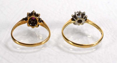 Lot 746 - Two 9ct yellow gold cluster rings set diamonds...