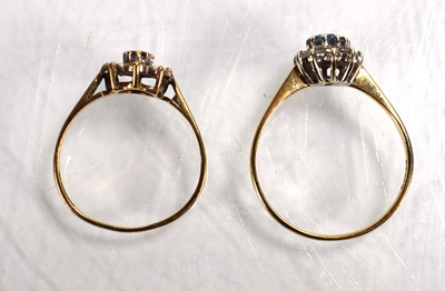 Lot 746 - Two 9ct yellow gold cluster rings set diamonds...