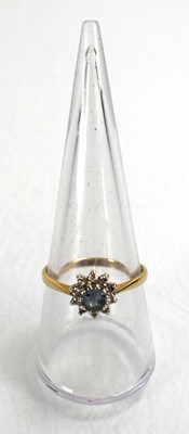 Lot 746 - Two 9ct yellow gold cluster rings set diamonds...