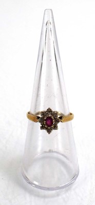 Lot 746 - Two 9ct yellow gold cluster rings set diamonds...