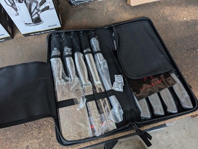 Lot 144 - Samurai 9-piece knife set in zip up case