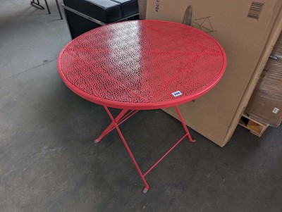 Lot 245 - 76cm diameter red folding table, (boxed)