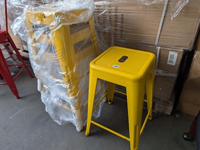 Lot 352 - 4 antique yellow effect stacking metal stools,...