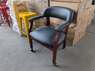 Lot 358 - Reproduction leather effect chair on ball...