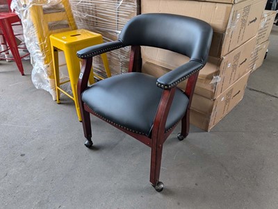 Lot 363 - Reproduction leather effect chair on ball...