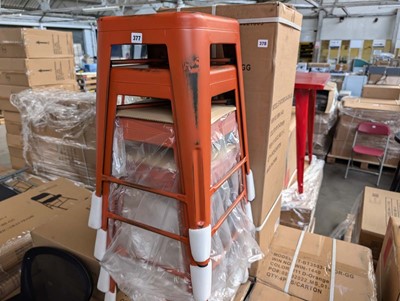 Lot 378 - 4 antique orange metal stacking bar stools,...