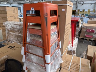 Lot 379 - 4 antique orange metal stacking bar stools,...