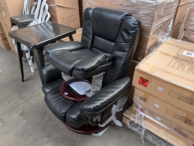 Lot 399 - Beige leather effect easy chair with matching...