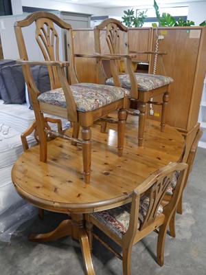 Lot 1006 - Modern pine oval extending dining table with 6...