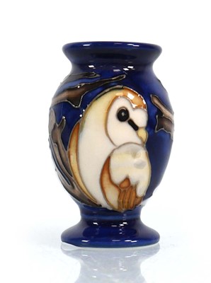 Lot 338 - A miniature Moorcroft vase decorated with barn...