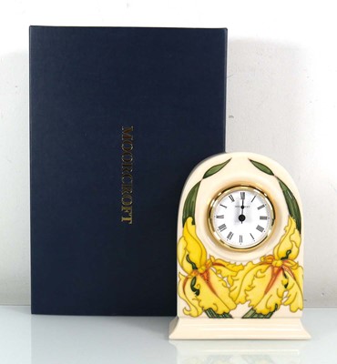 Lot 342 - A Moorcroft mantle timepiece of arched form...