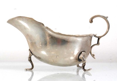 Lot 364 - A silver sauce boat of typical form with...