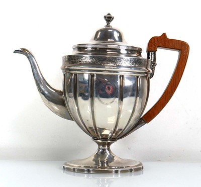 Lot 365 - A George III silver teapot of urn shaped form,...