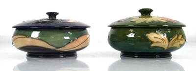 Lot 300 - Two Moorcroft lidded powder bowls, one...