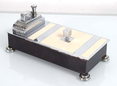 Lot 41 - A Ronson 'Touch Tip' cigarette box and lighter...
