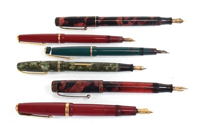 Lot 44 - A group of three Parker fountain pens with...