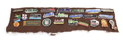 Lot 50 - A group of twenty-four enamelled badges...