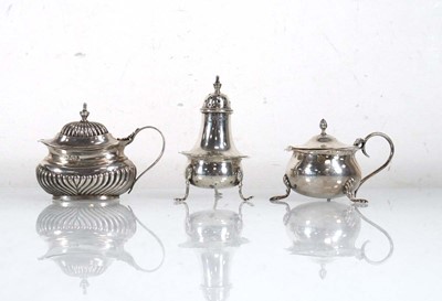 Lot 377 - An Edwardian silver mustard on three outswept...