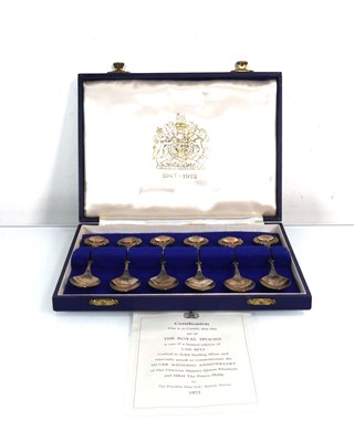 Lot 385 - A set of six limited edition silver spoons...