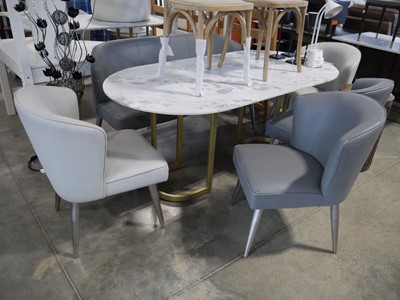Lot 1026 - Oval marble effect dining table on gold metal...