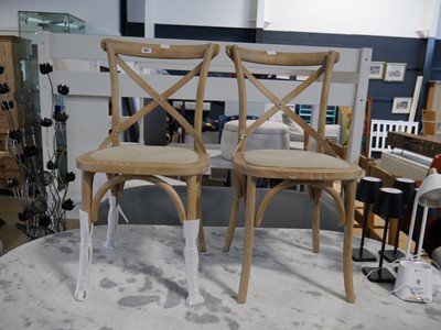 Lot 1027 - Pair of wooden natural coloured upholstered...