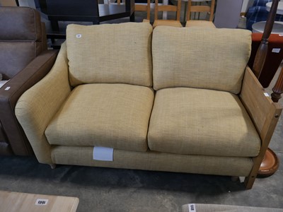 Lot 1041 - Natural coloured upholstered 2 seater sofa