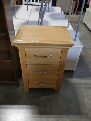 Lot 1049 - Light wood effect 3 drawer bedside drawers
