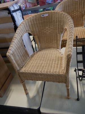 Lot 1064 - Pair of natural coloured wicker armchairs
