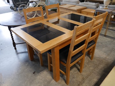 Lot 1067 - Modern light oak effect extending dining table...