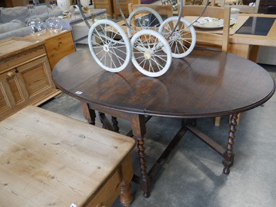 Lot 1075 - Oak barley twist drop leaf dining table