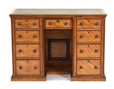 Lot 7 - A Victorian satinwood kneehole dressing chest...