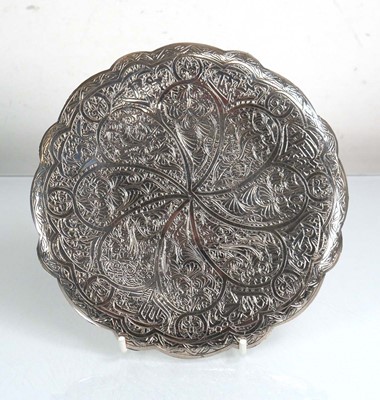 Lot 390 - An Egyptian metalware presentation dish...