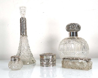 Lot 391 - A late Victorian repousse decorated silver...