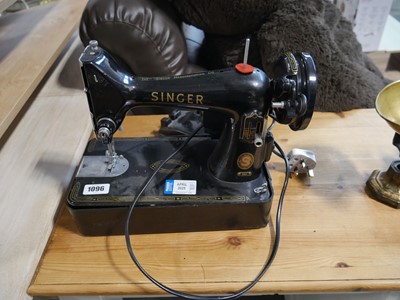 Lot 1096 - Singer electric powered sewing machine (99K)