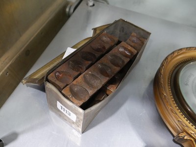 Lot 1113 - Tin containing cast iron mouldings