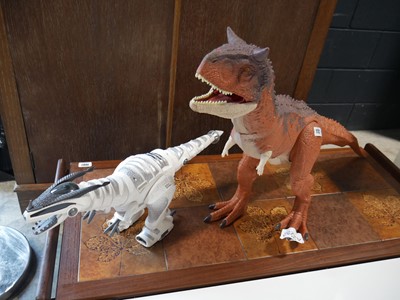 Lot 1122 - 2 dinosaur models, 1 realistic and 1 futuristic