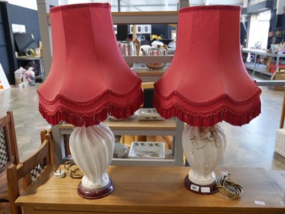 Lot 1124 - Pair of ornate table lamps with red ruffled...