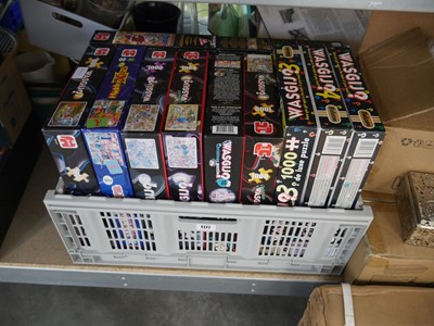 Lot 1177 - Grey plastic crate containing Wasgij jigsaw...
